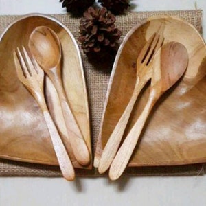 a pair of teak wood plates in the shape of love complete with cutlery / Wooden plates/Teak wood plates
