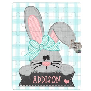 May include: A gray bunny with pink ears and a turquoise bow holding a black banner with the name Addison written in pink with a pink heart.