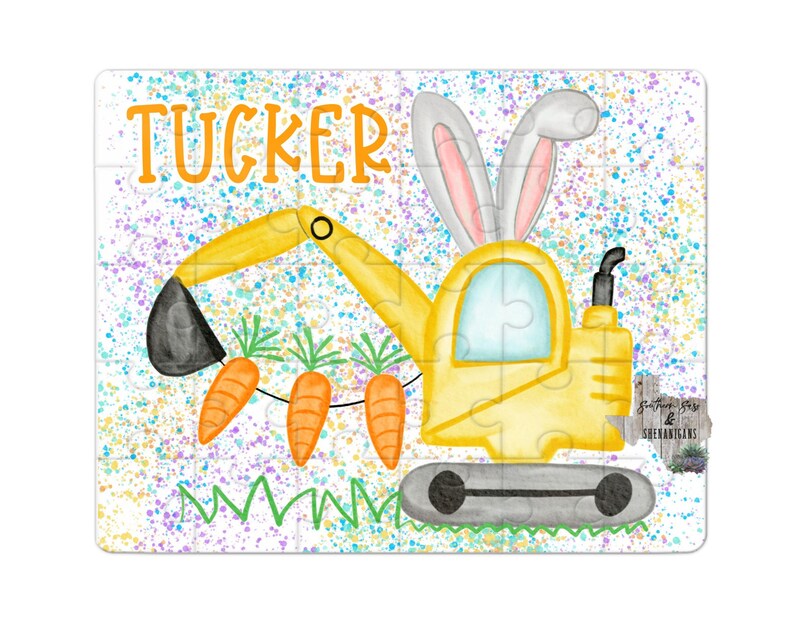 May include: A yellow toy excavator with bunny ears, holding three orange carrots. The excavator is on a white background with colorful paint splatters. The text "TUCKER" is written above the excavator.