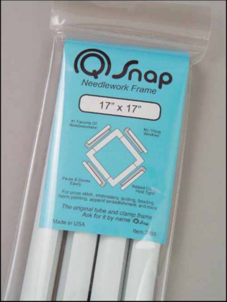 May include: A white Q-Snap needlework frame in a clear plastic bag. The frame is 17 inches by 17 inches. The packaging features a blue background with white text and a diagram of the frame.