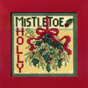 May include: A framed cross-stitch featuring the words "MISTLETOE" and "HOLLY" with a red bow and a sprig of mistletoe. The artwork is set against a yellow background with a green border and a red frame. A festive holiday decoration.