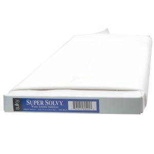 May include: A white roll of Sulky Super Solvy water soluble stabilizer, a fabric stabilizer used for embroidery and other crafts. The roll is packaged in a white box with blue text and a barcode. The text on the box reads "Sulky Super Solvy Water Soluble Stabilizer, Weight: Medium, Size: 19-1/2 x 25 yd Roll, Item 400-25".