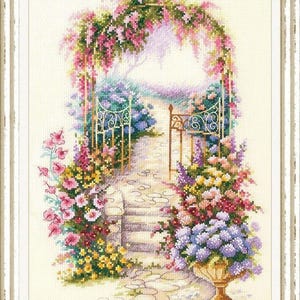 May include: Cross-stitch embroidery of a garden scene with a stone pathway leading to a gate and archway covered in pink and purple flowers. A gold urn overflows with colorful blooms.