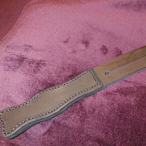 Elegant, hard leather tawse with two straps - leaves perfect marks