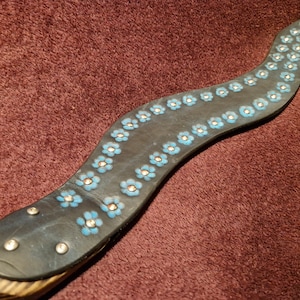 Tentacle paddle - beautiful and decorative with two differently textured sides.