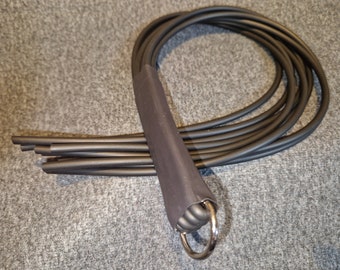 Frusta di gomma con otto corde di gomma spessa e morbida - lascia rapidamente segni - BDSM - gomma - frusta dura