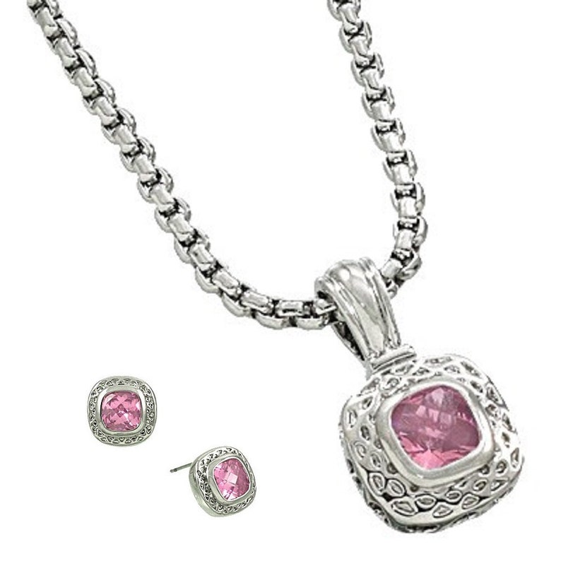 May include: A silver chain necklace with a square pendant featuring a pink gemstone. Matching square stud earrings with pink gemstones.