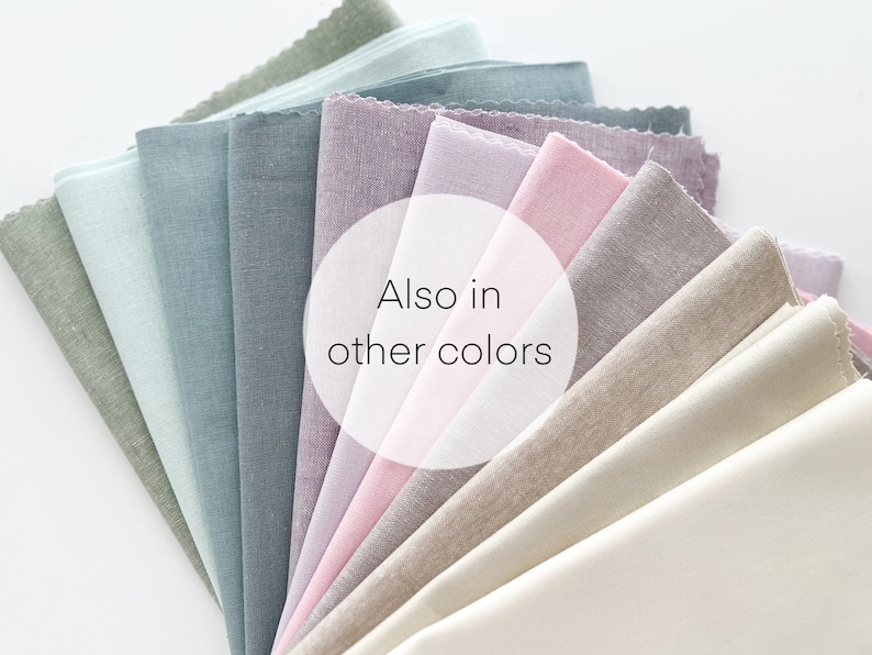 May include: A fan of fabric swatches in various shades of green, blue, pink, beige, and white. The text "Also in other colors" is visible in the center of the image.