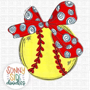 Puede incluir: Una pelota de softball amarilla con costuras rojas y un lazo rojo con lunares azules y blancos. El lazo está atado alrededor de la pelota de softball.