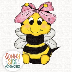 May include: A cartoon bee with a pink bow and black and yellow stripes. The bee is sitting on its hind legs with its wings spread out. The bee has a happy expression on its face.