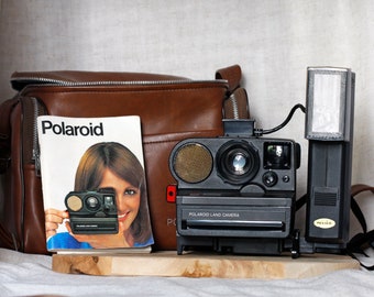 Polaroid land camera Sonar Autofocus 5000 vintage sx-70 poltronic flash and leather case