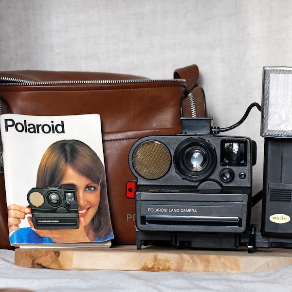 Polaroid Land Kamera Sonar Autofokus 5000 vintage sx-70 Poltronik Blitz und Ledertasche