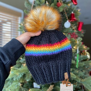 Retro Rainbow knitted winter hat with detachable faux fur Pom Pom.