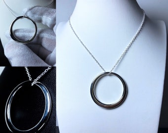Offset circle silver pendant