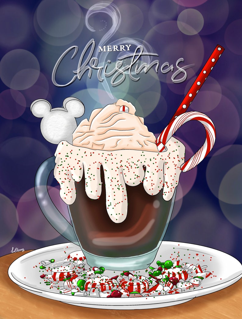 May include: A festive hot chocolate drink with whipped cream, red and green sprinkles, and a candy cane. The drink is topped with a Mickey Mouse marshmallow and a red and white striped straw. The text "Merry Christmas" is written in white cursive above the drink.