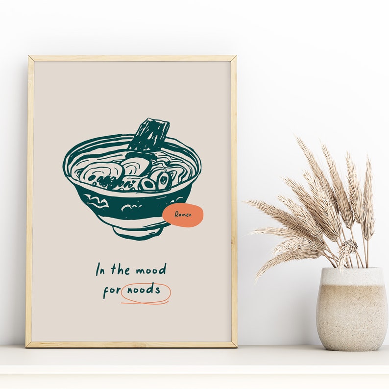 May include: A beige poster with a teal illustration of a bowl of ramen noodles. The text "Ramen" is written in a teal circle. The text "In the mood for noodles" is written in black with a teal circle around the word "noodles".