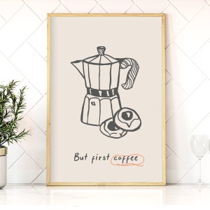 Peut inclure: Une illustration en noir et blanc d'une cafetière et de deux pâtisseries avec le texte "But first coffee" dans une police d'écriture manuscrite.