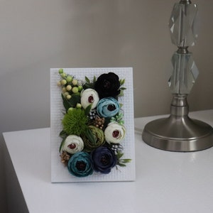 frame with artificial flowers, peonies arrangement with greenery and moss, wall decor, table decor