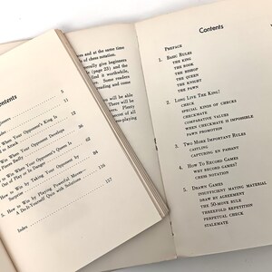 May include: A book titled "Chess for Beginners" with a table of contents listing chapters on basic rules, checkmate, castling, recording games, and drawn games.