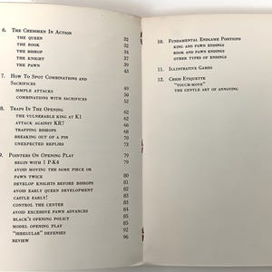 May include: A book titled "Chess" with a table of contents listing chapters on chess strategy, tactics, and endgames. The book is open to pages 6-12, showing the chapter titles and page numbers.