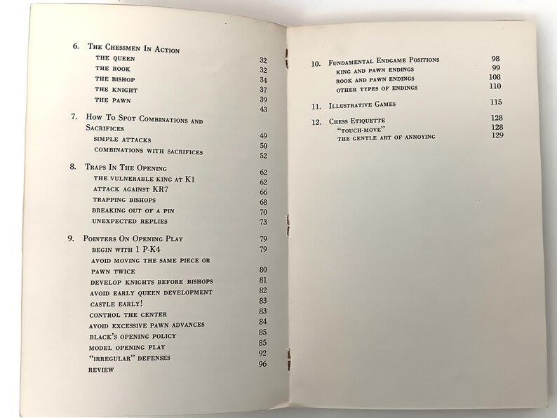May include: A book titled "Chess" with a table of contents listing chapters on chess strategy, tactics, and endgames. The book is open to pages 6-12, showing the chapter titles and page numbers.