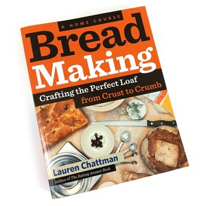 May include: A book titled "Bread Making: Crafting the Perfect Loaf from Crust to Crumb" by Lauren Chattman, author of "The Baking Answer Book". The cover features a close-up of a loaf of bread, a focaccia, and various baking tools.