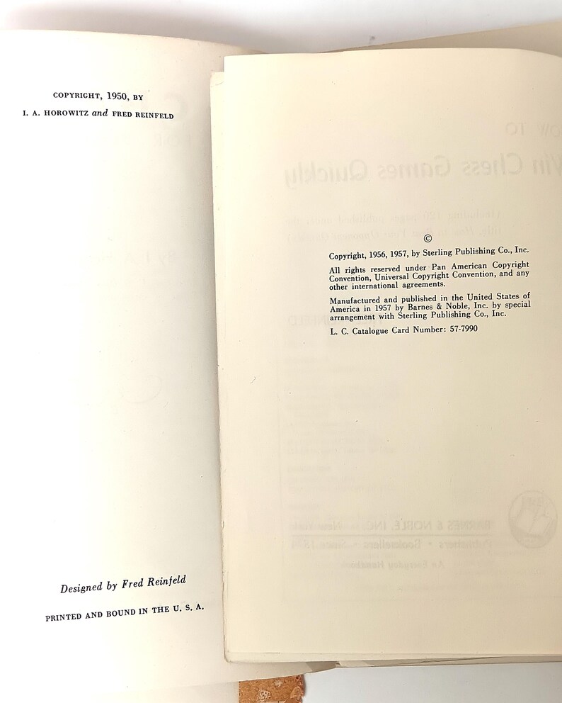 May include: A book titled "Chess Games Quickly" with copyright information from 1950, 1956, and 1957. The book was designed by Fred Reinfeld and printed and bound in the U.S.A.