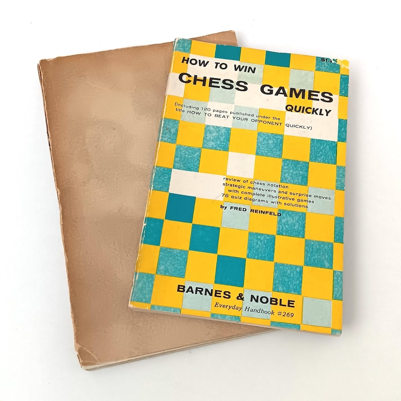 May include: A yellow and blue book titled "How to Win Chess Games Quickly" by Fred Reinfeld. The book is a Barnes & Noble Everyday Handbook #269.