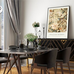 May include: A black and gold sideboard with a geometric pattern and a framed print of a bird and flowers. The print is titled "The Garden of William Morris".
