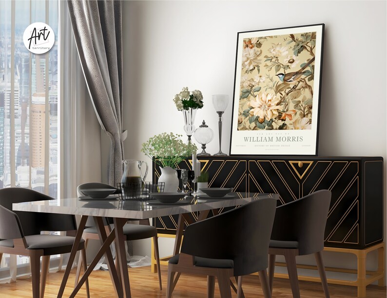 May include: A black and gold sideboard with a geometric pattern and a framed print of a bird and flowers. The print is titled "The Garden of William Morris".