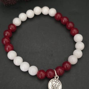 Canada flag bracelet with a pewter charm