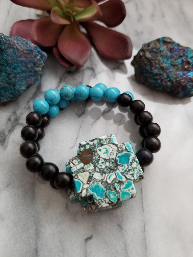 Sothwest cross in black stretch bracelet