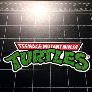 TMNT Teenage Mutant Ninja Turtles 80s toy logo sticker decal 80s cartoon 1980s toys