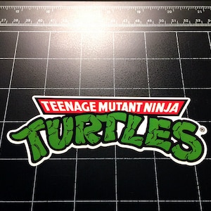 TMNT Adolescente Mutante Ninja Tortugas 80s juguete logo pegatina calcomanía 80s dibujos animados 1980s juguetes
