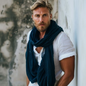 Man wearing linen scarf in storm blue color