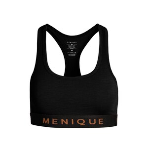 May include: Black sports bra with a racerback design. The bra features a wide band with the brand name "MENIQUE" in a copper color. The bra has a scoop neckline and is made of a textured fabric. The size is XS.