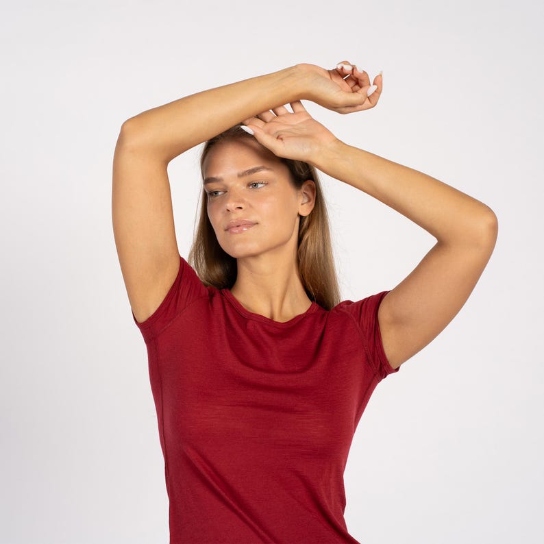 Close-up of women’s royal cherry Merino T-shirt – breathable wool short sleeve top