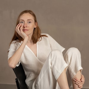 Tall red hair woman wearing beautiful Linen Jumpsuit with kimono sleeves in Pure white color