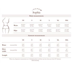 May include: Size chart for women's clothing with measurements in inches and centimeters. The chart includes sizes XS, S, M, L, XL, and XXL. Measurements are provided for waist and hips, as well as garment measurements for waist, hem width, and length.