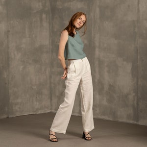 Tall women with red hair wearing Linen crop top blouse with cross back and classic Linen pants Lotus