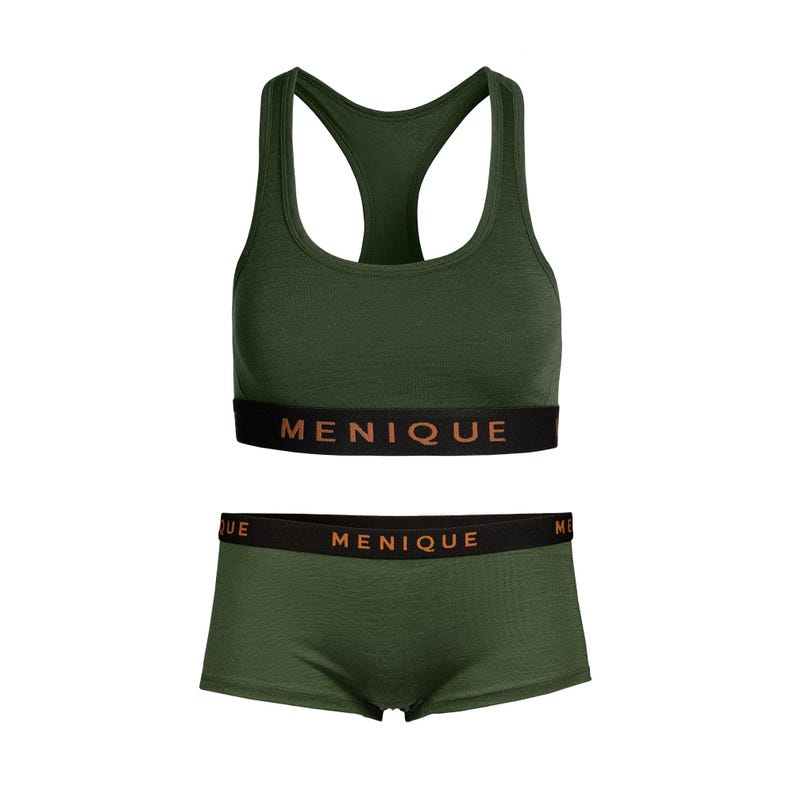 The menique women's merino wool sports bra and boxer briefs underwear set in dark green color, white background.
