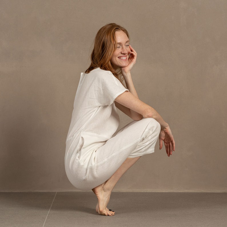 Tall red hair woman wearing beautiful Linen Jumpsuit with kimono sleeves in Pure white color