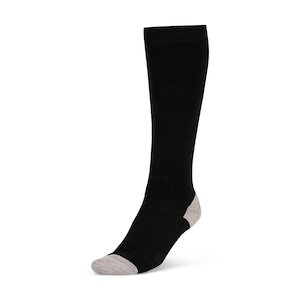 May include: A single black knee-high sock with a grey heel and toe. The sock is made of a ribbed knit material and is designed to be worn on the left foot. The sock is standing upright against a white background.