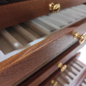 Wooden display cabinet for 133 collectible fountain pens, handmade in Italy - size reference