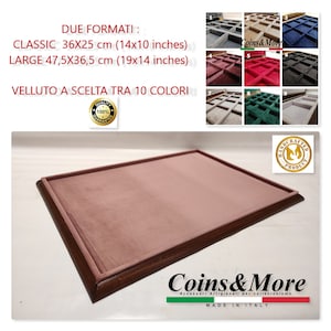 May include: A wooden coin tray with a brown velvet lining. The tray is handcrafted and made in Italy. The tray is available in two sizes: Classic (14x10 inches) and Large (19x14 inches).