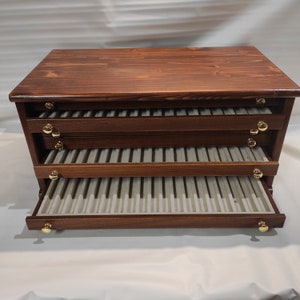 Wooden display cabinet for 133 collectible fountain pens, handmade in Italy - close-up