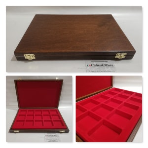 May include: A wooden coin box with a red velvet interior and 16 compartments. The box has two brass clasps and a label that reads "Coins & More".