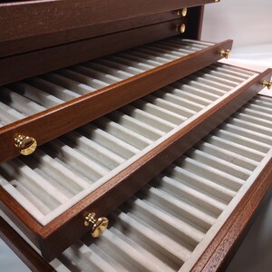 Wooden display cabinet for 133 collectible fountain pens, handmade in Italy - open view