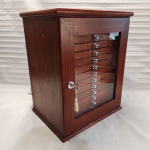 Mahogany-finish wooden coin cabinet with 15 drawers glass door and lock, handmade in Italy - close-up