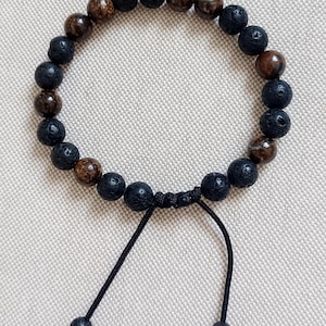 Mixed bracelet made of natural bronzite and lava stone stones